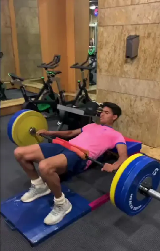 A bowler doing barbell hip thrusts